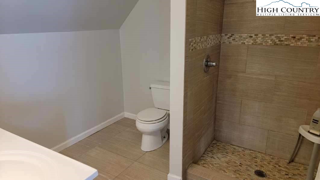 412 Mulberry Mountain Road Boone, NC 28607 - Photo 23 of 31 a bathroom with a toilet