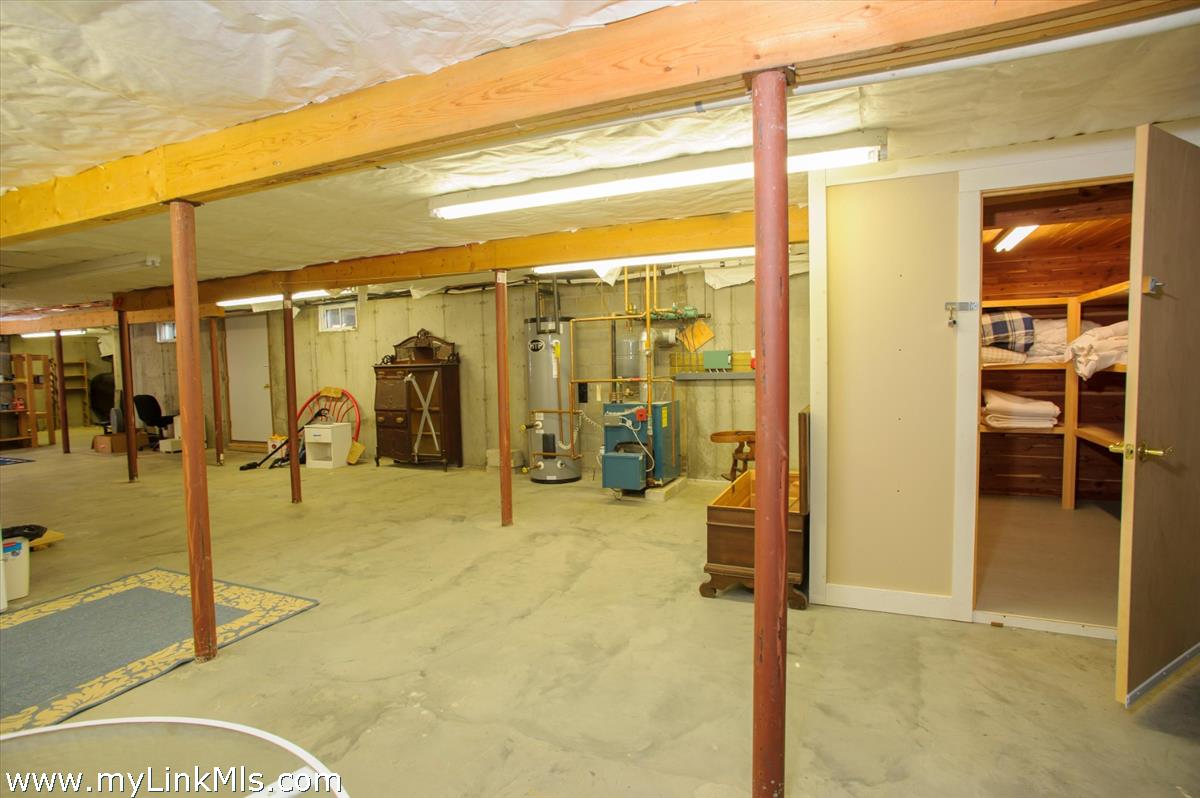 20 East Side Road Oak Bluffs, MA 02557 - Photo 17 of 17 Large working basement with owners cedar lined closet