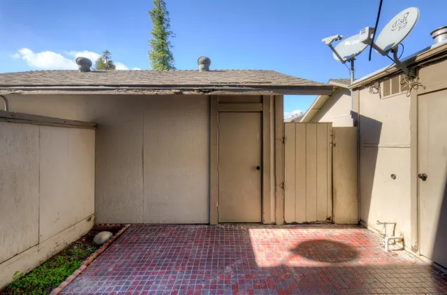 a view of a door and a window