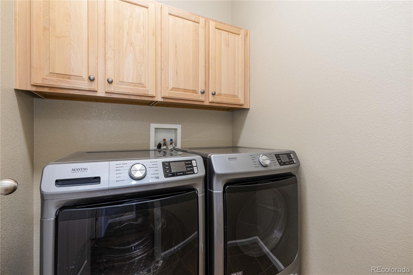 3301 Cascina Circle, Unit C Highlands Ranch, CO 80126 - Photo 24 of 40 a view of washer and dryer