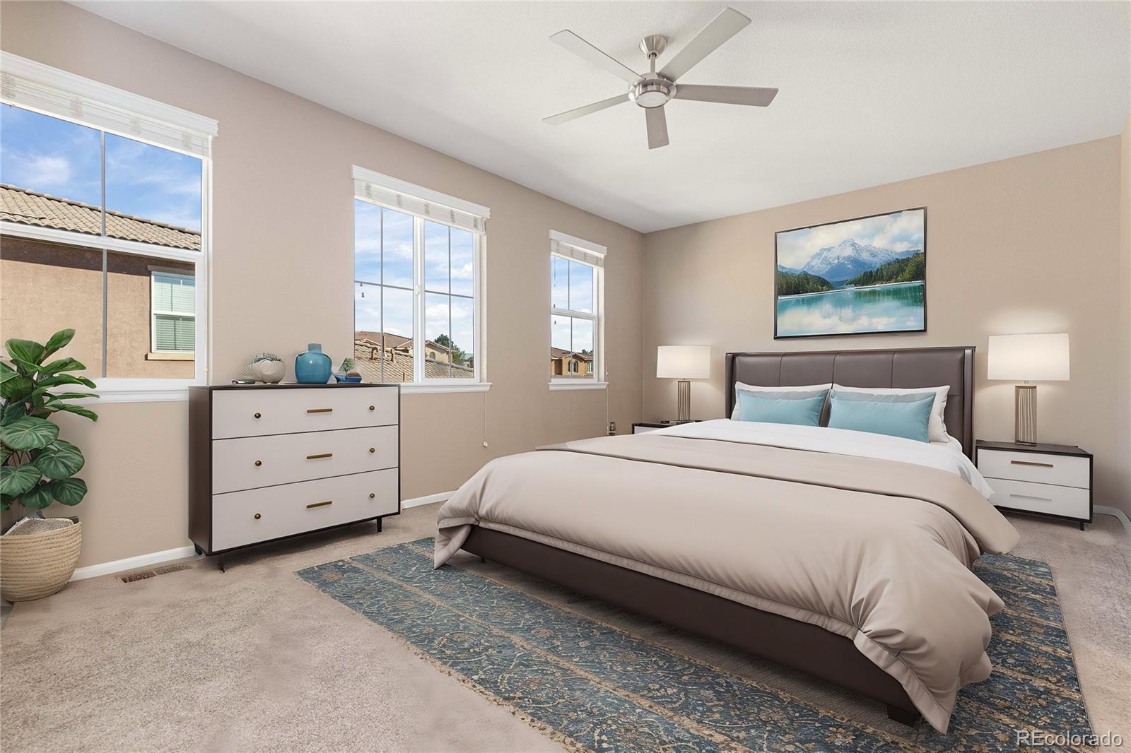 3301 Cascina Circle, Unit C Highlands Ranch, CO 80126 - Photo 25 of 40 a bedroom with a bed and a window
