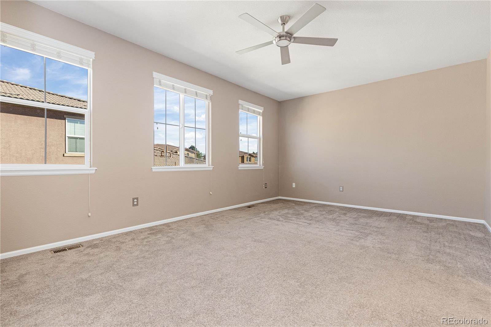 3301 Cascina Circle, Unit C Highlands Ranch, CO 80126 - Photo 26 of 40 a view of an empty room with a window