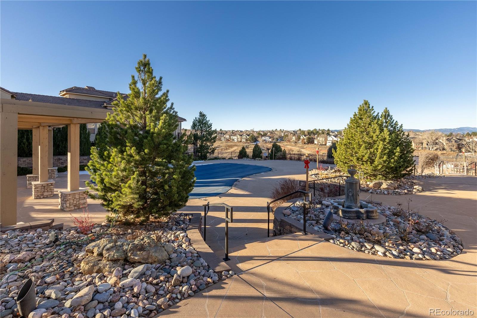3301 Cascina Circle, Unit C Highlands Ranch, CO 80126 - Photo 38 of 40 a view of a chairs and table in the patio