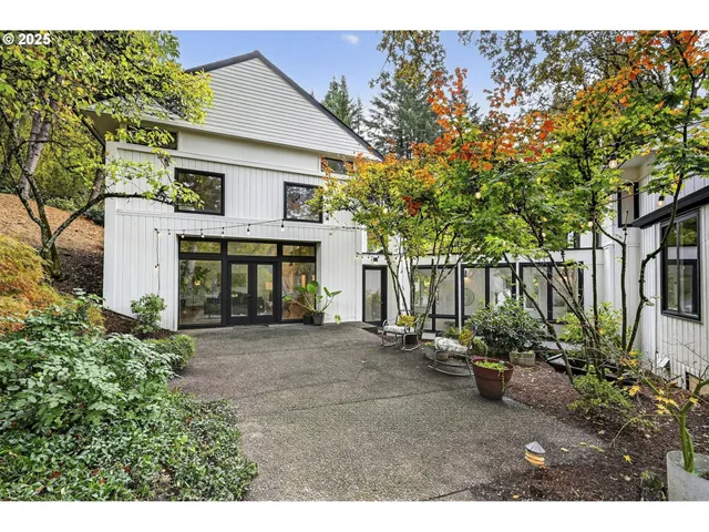 a view of a house with a garden