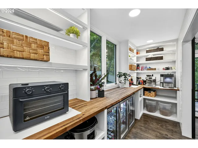 a kitchen with a stove and a sink
