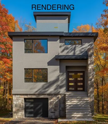 a front view of a house with a garage