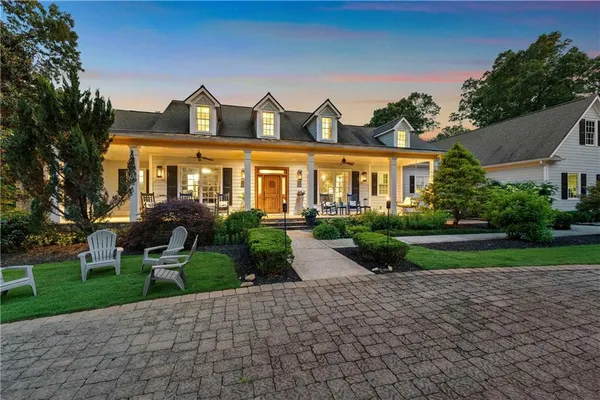 a front view of a house with a porch