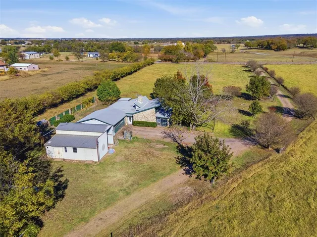 an aerial view of a city with houses