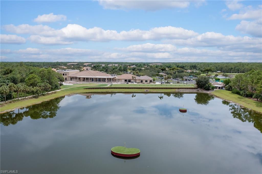 8670 Cedar Hammock Circle, Unit 223 Naples, FL 34112 - Photo 27 of 27 a view of a lake with a mountain view