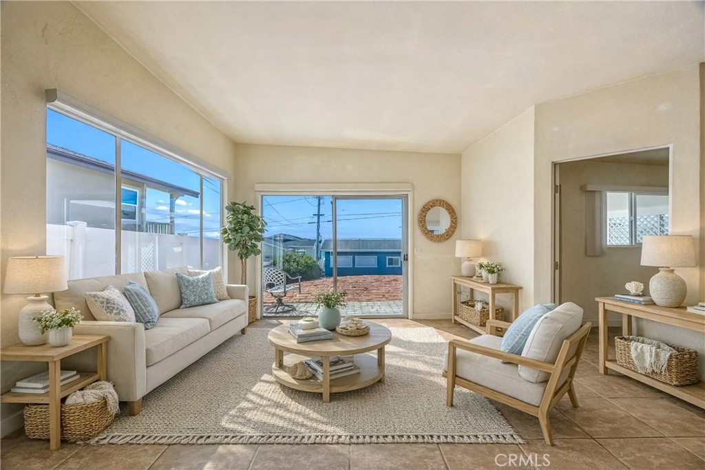 3437 Shearer Avenue Cayucos, CA 93430 - Photo 3 of 24 a living room with furniture and a large window