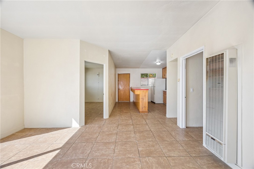 3437 Shearer Avenue Cayucos, CA 93430 - Photo 6 of 24 a view of a kitchen with a sink and a refrigerator