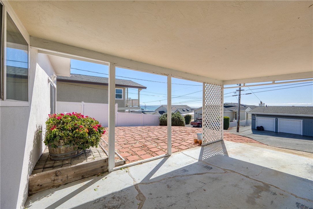3437 Shearer Avenue Cayucos, CA 93430 - Photo 8 of 24 a living room with furniture and flowers