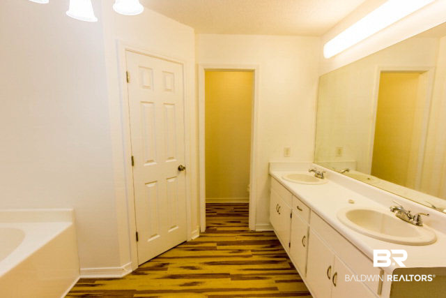 21675 Broad Street Silverhill, AL 36576 - Photo 18 of 31 His-and-Her Vanity Sinks