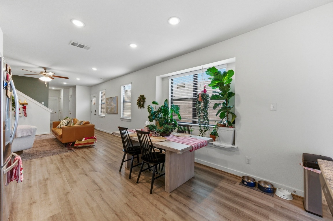 159 Threshing Road, Unit A Buda, TX 78610 - Photo 13 of 33 Dining area featuring recessed lighting, ceiling fan, light wood-type flooring, and stairs