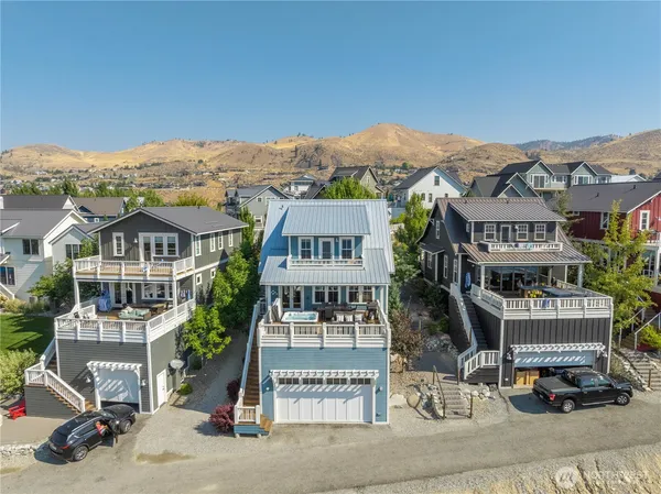 an aerial view of residential houses and street
