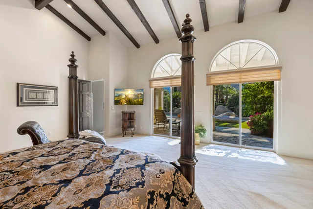 a bathroom with a sink double vanity and a mirror