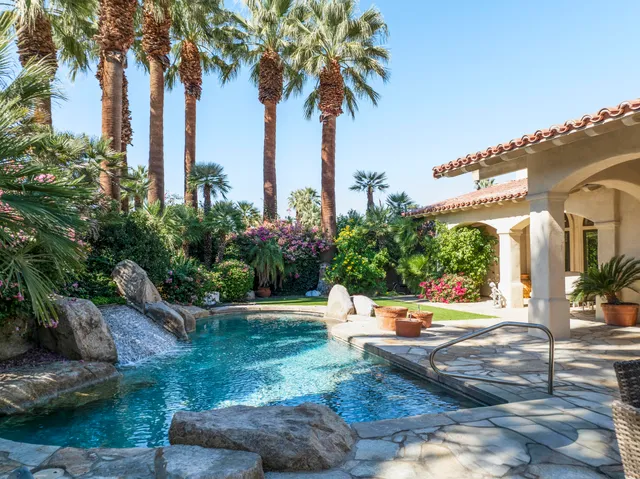 a view of a lake with a water fountain
