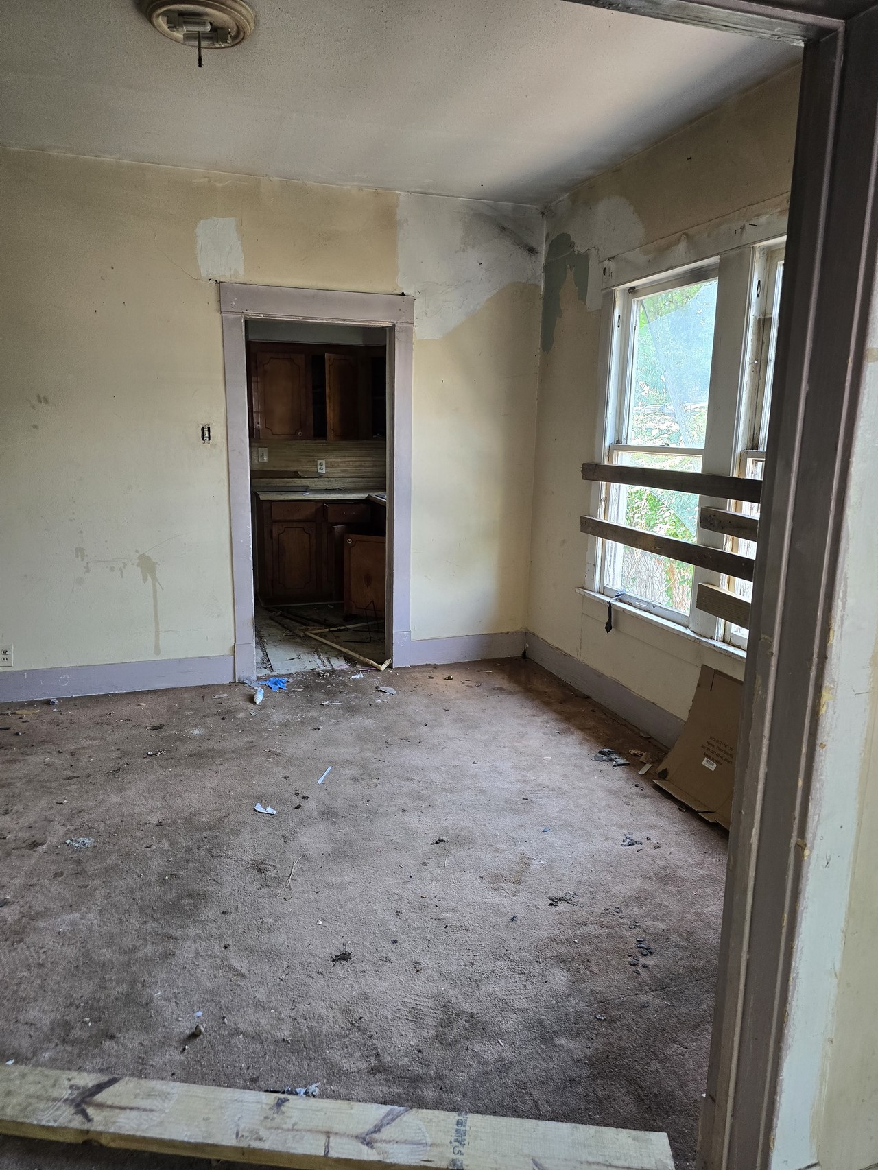 2305 Elysian Street Houston, TX 77026 - Photo 7 of 12 wooden floor and window in an empty room