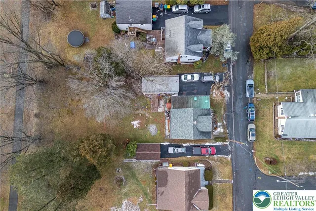 an aerial view of houses and roads