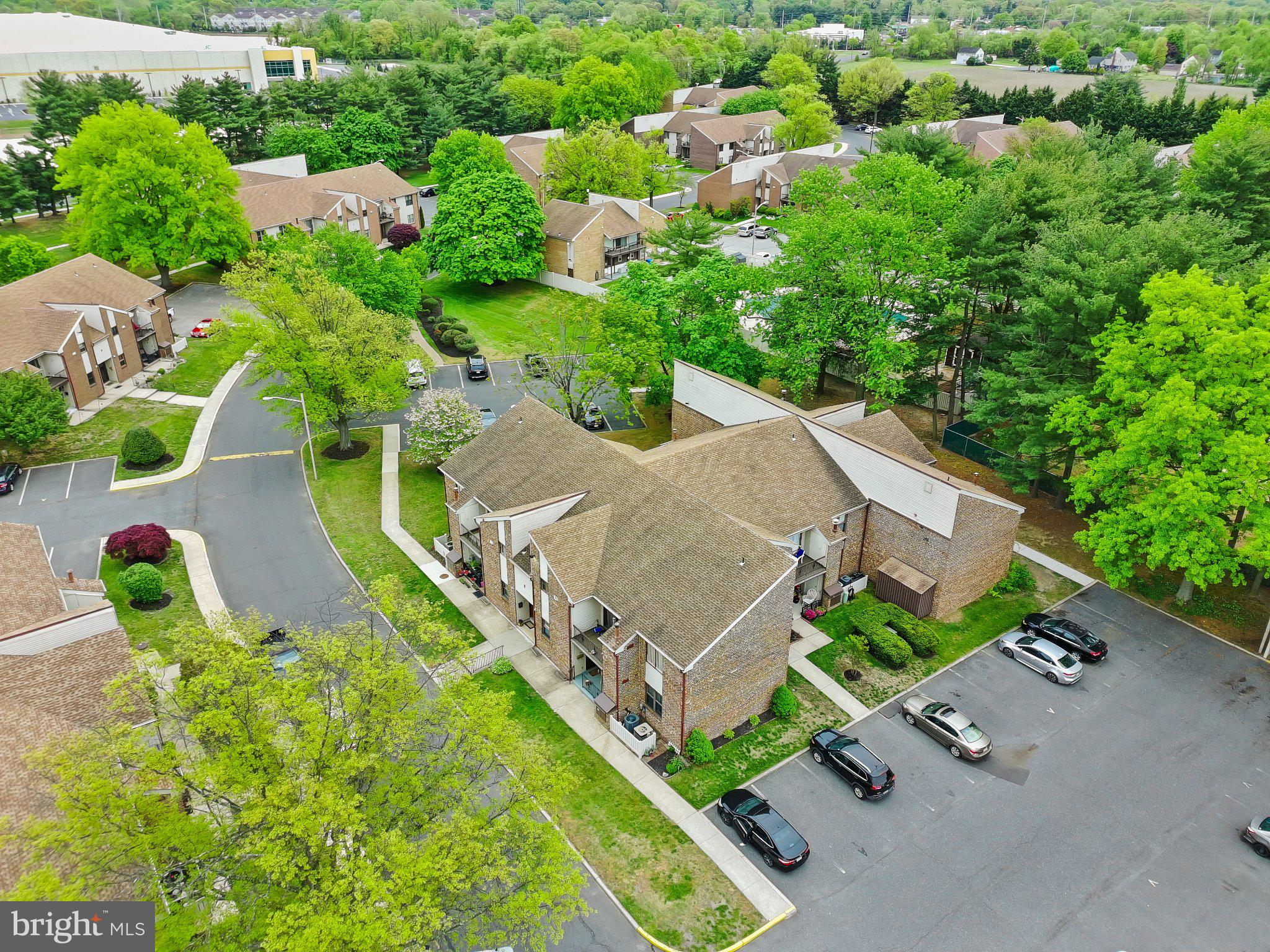 1475 Mt Holly Road, Unit F2 Edgewater Park, NJ 08010 - Photo 31 of 33 Lush greenery surrounds cozy residences.