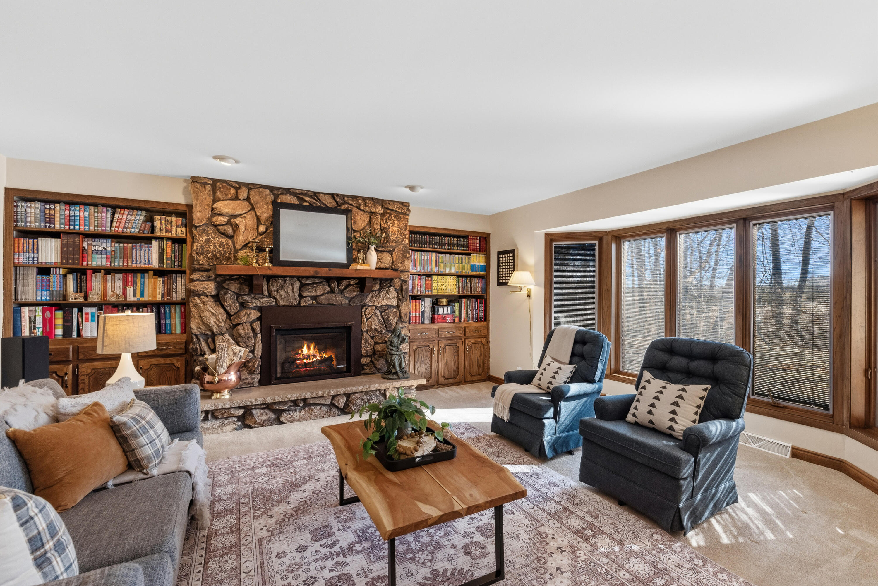 12785 West Bobwood Road New Berlin, WI 53151 - Photo 3 of 39 Built In Bookshelves and Views of the Beautiful Setting
