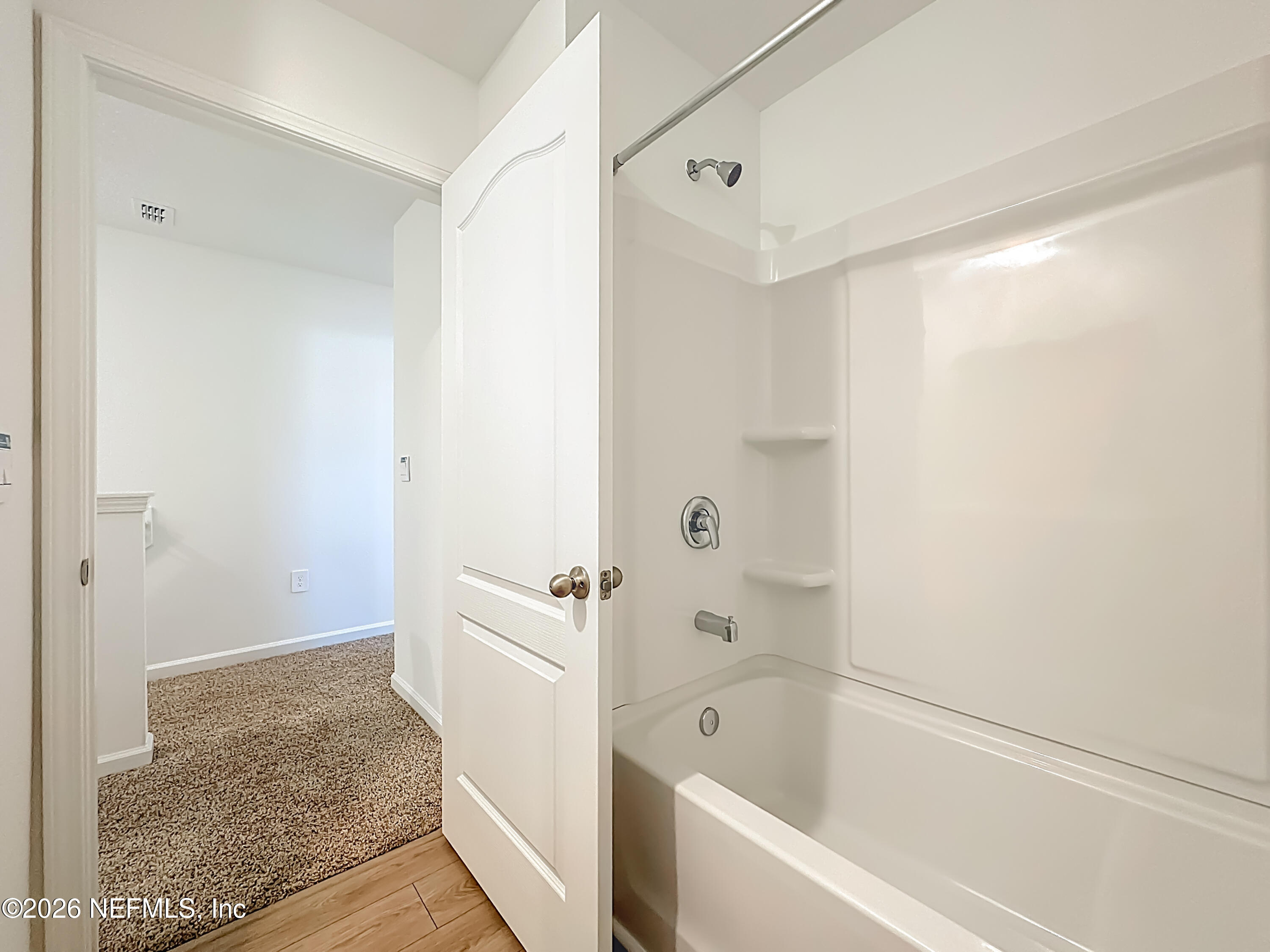 177 Palmetto Rdg Road St. Augustine, FL 32095 - Photo 13 of 19 a bathroom with a bathtub and a shower