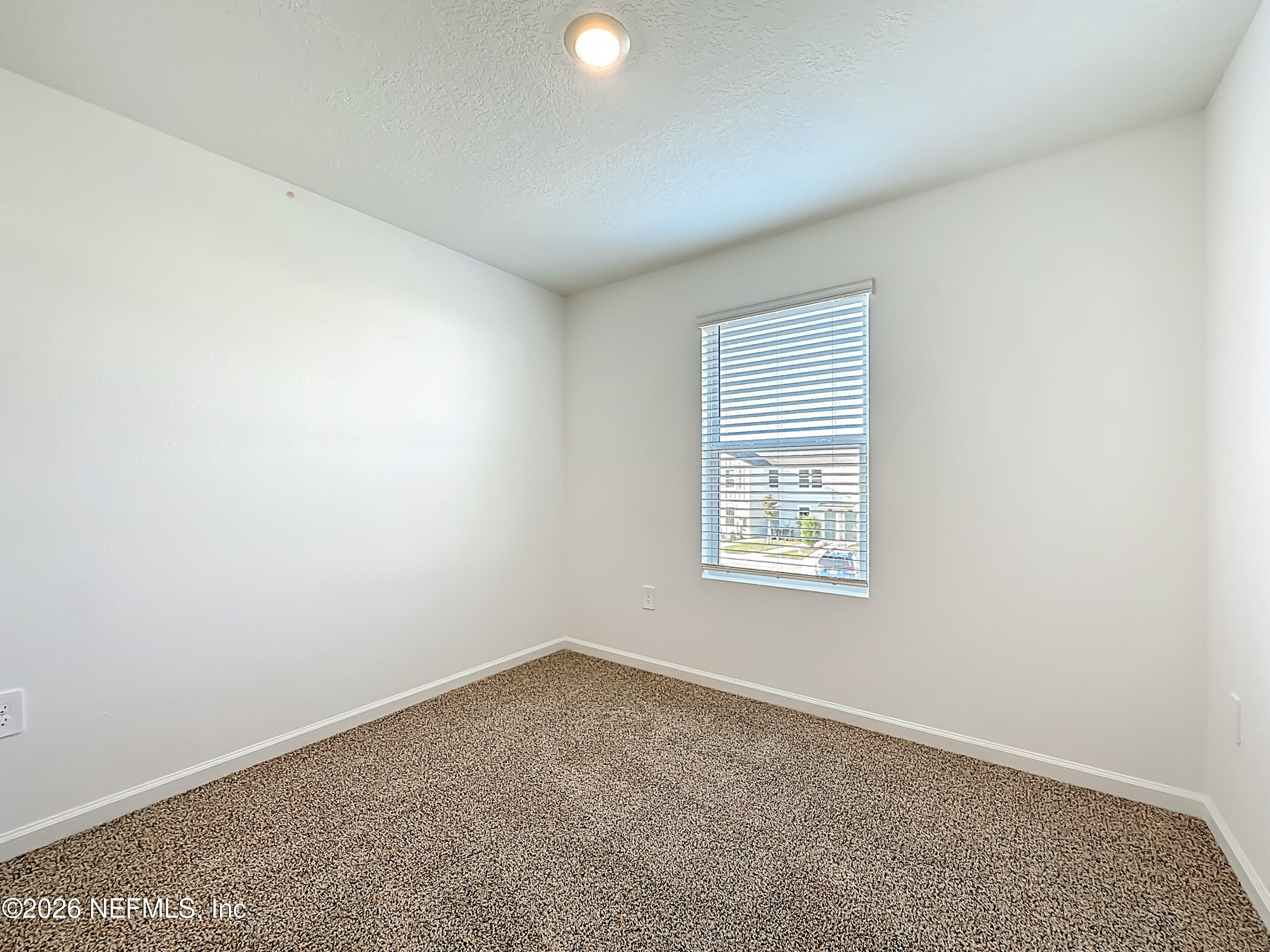 177 Palmetto Rdg Road St. Augustine, FL 32095 - Photo 15 of 19 an empty room with a window