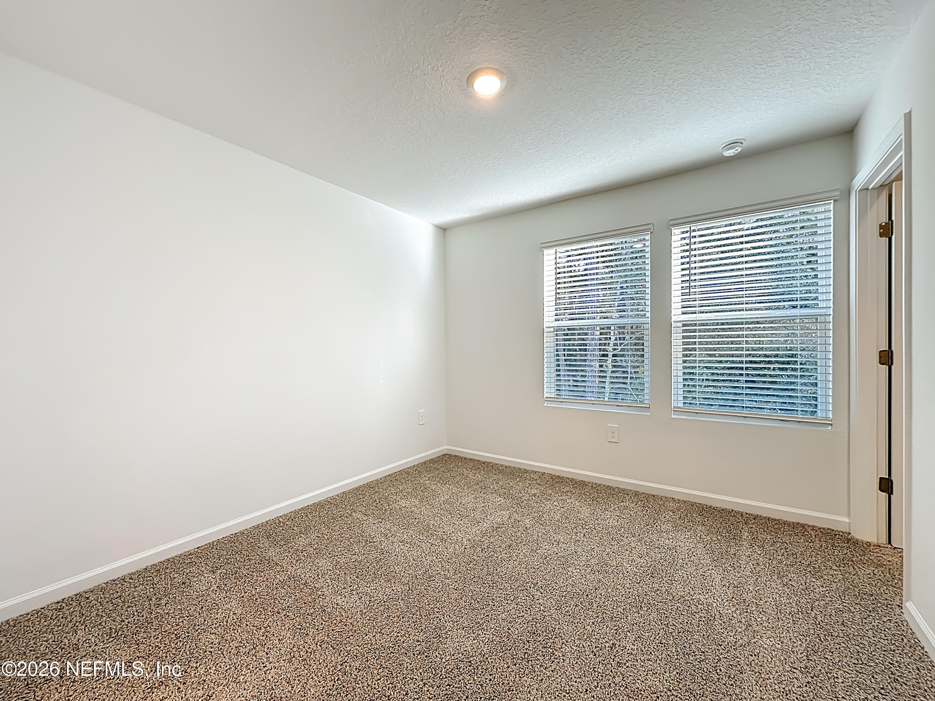 177 Palmetto Rdg Road St. Augustine, FL 32095 - Photo 16 of 19 an empty room with windows