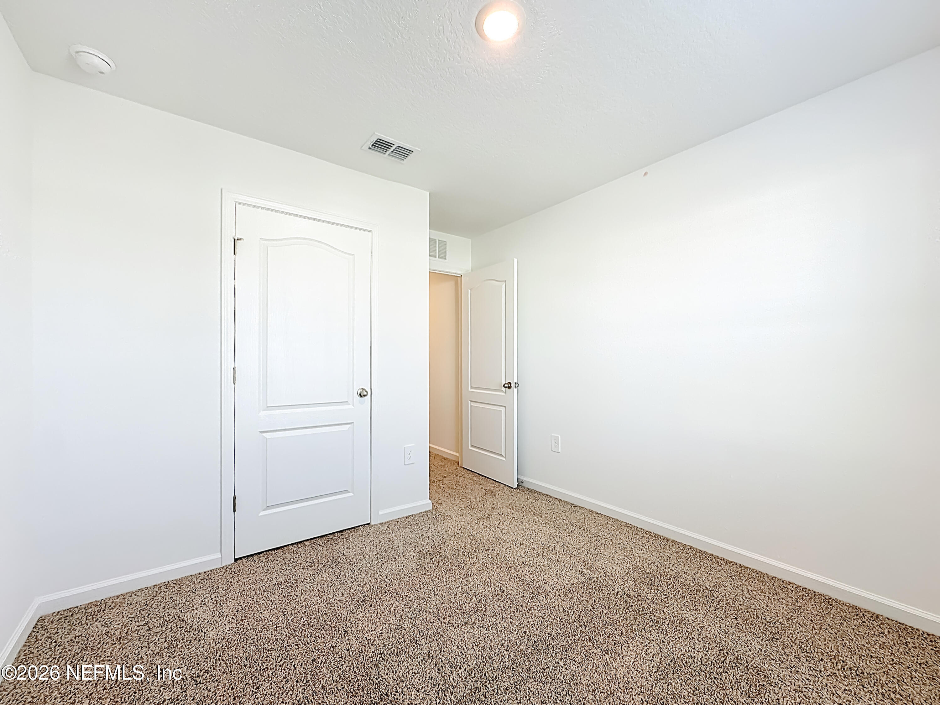 177 Palmetto Rdg Road St. Augustine, FL 32095 - Photo 17 of 19 a view of an empty room