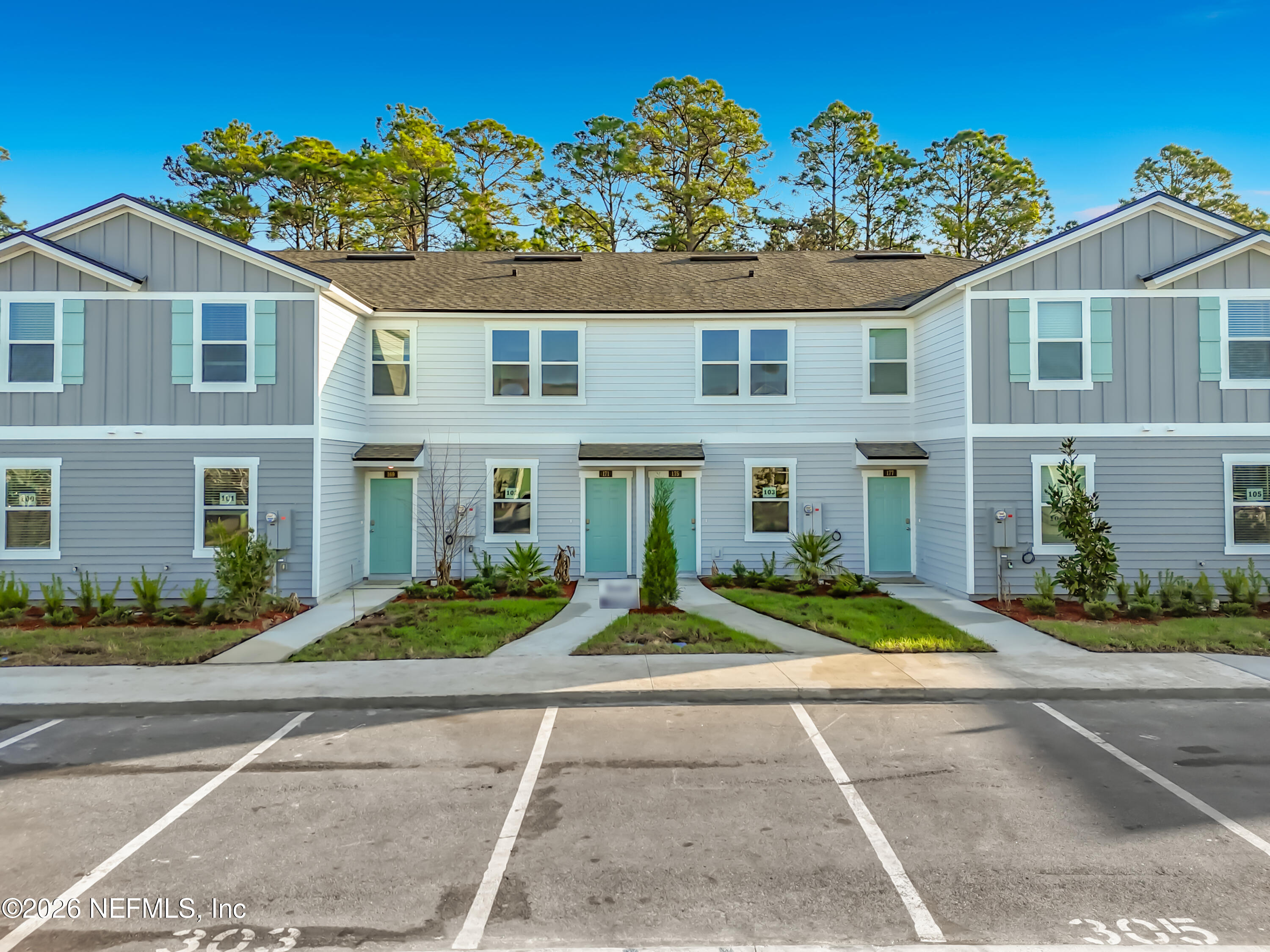 177 Palmetto Rdg Road St. Augustine, FL 32095 - Photo 2 of 19 front view of a house with a garden