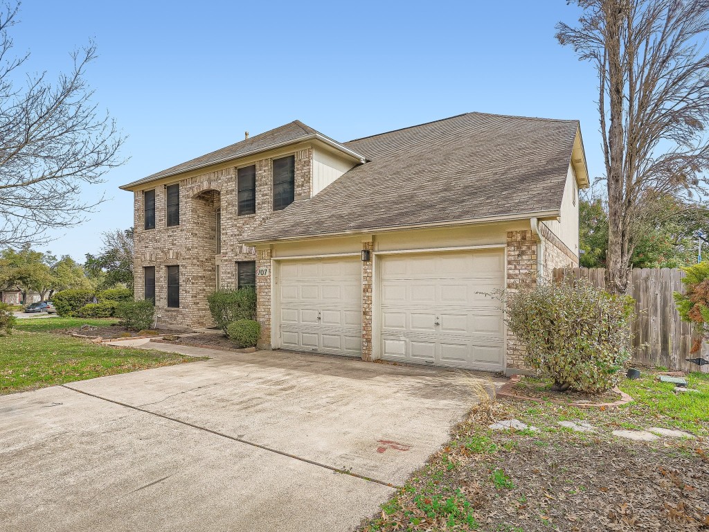 707 Wagon Wheel Trail Pflugerville, TX 78660 - Photo 1 of 1 a view of a house with a yard