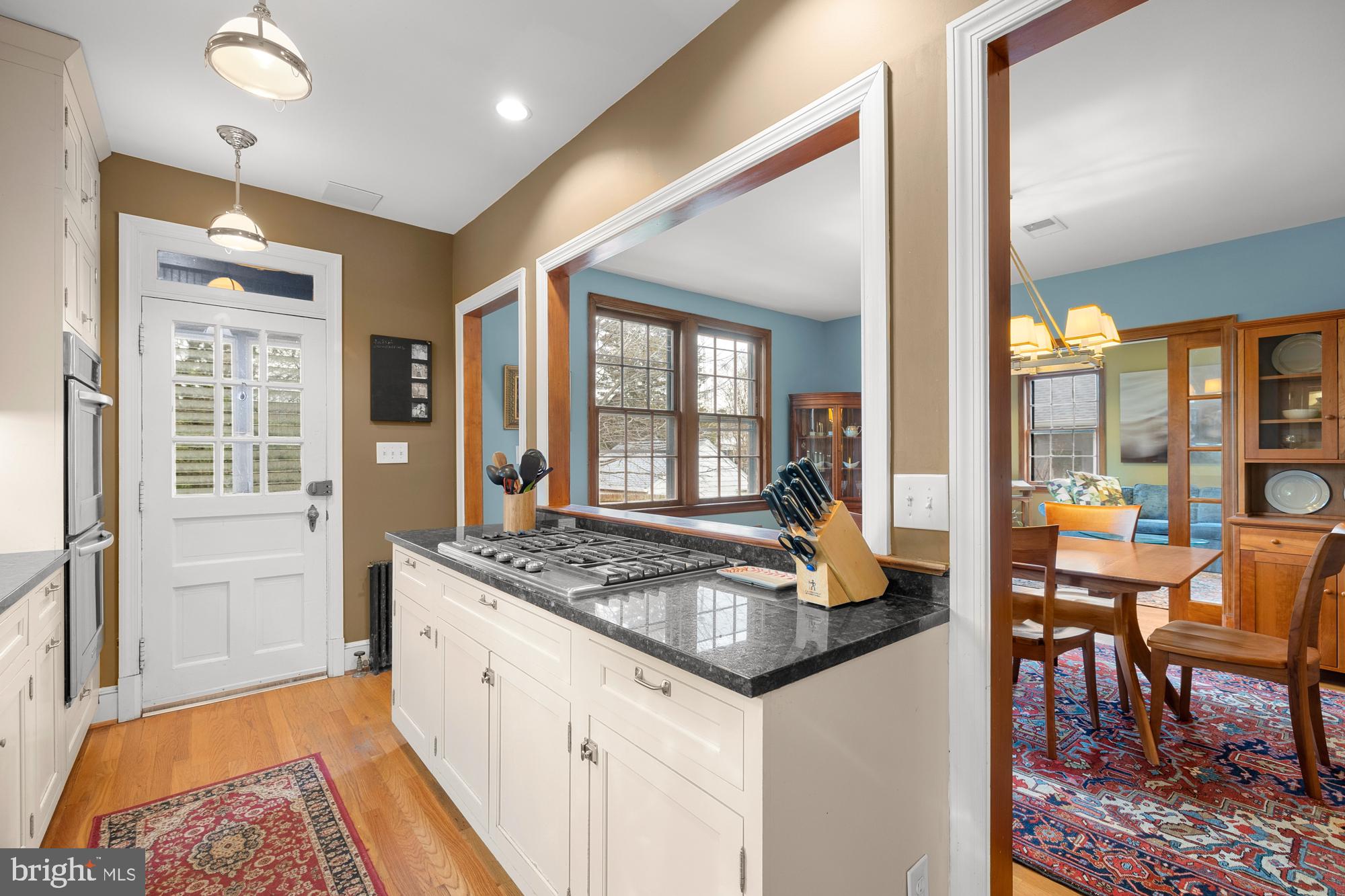 1441 Manchester Lane Northwest Washington, DC 20011 - Photo 15 of 63 a kitchen that has a table and chairs in it