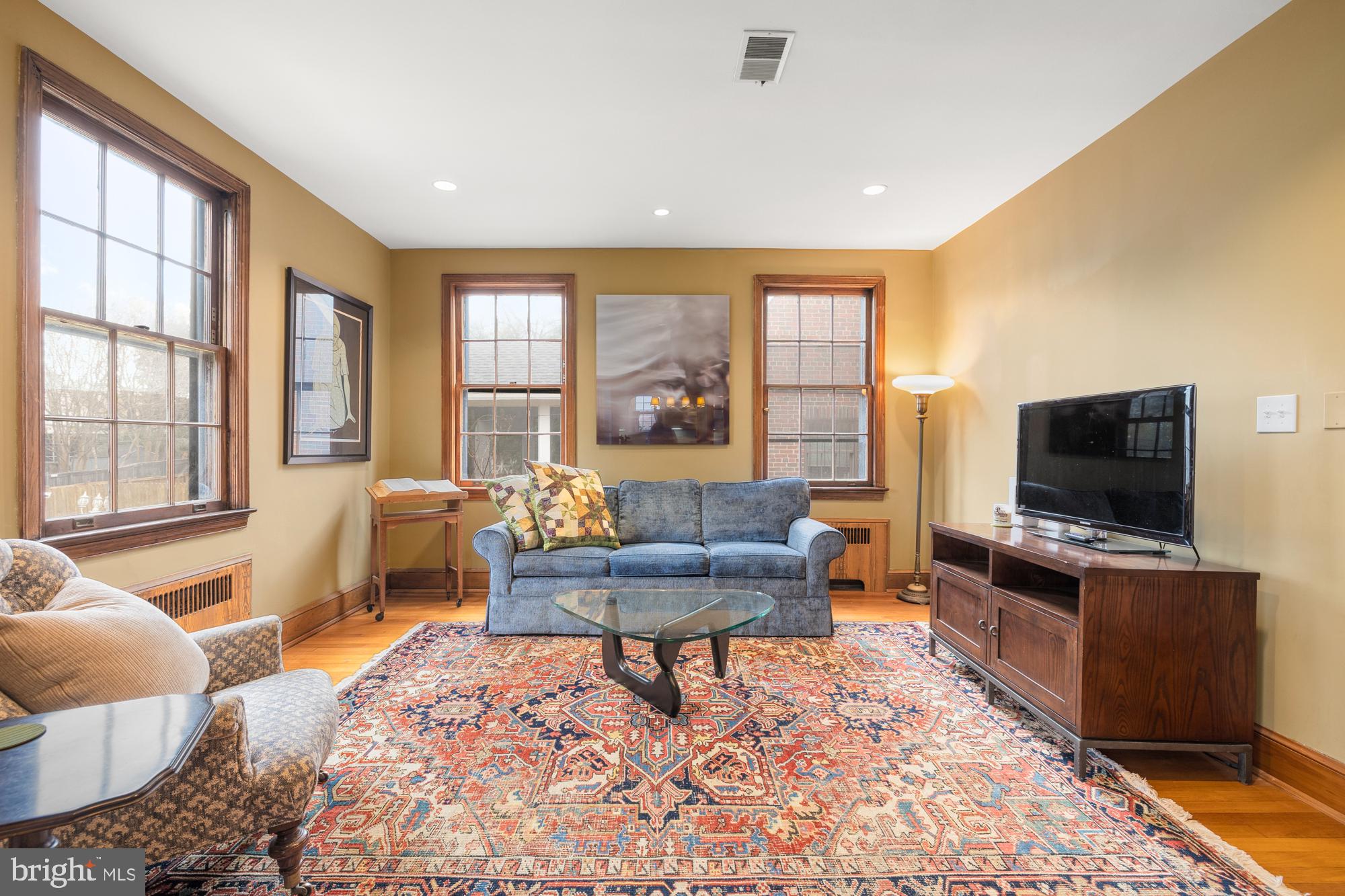 1441 Manchester Lane Northwest Washington, DC 20011 - Photo 17 of 63 a living room with furniture and a flat screen tv