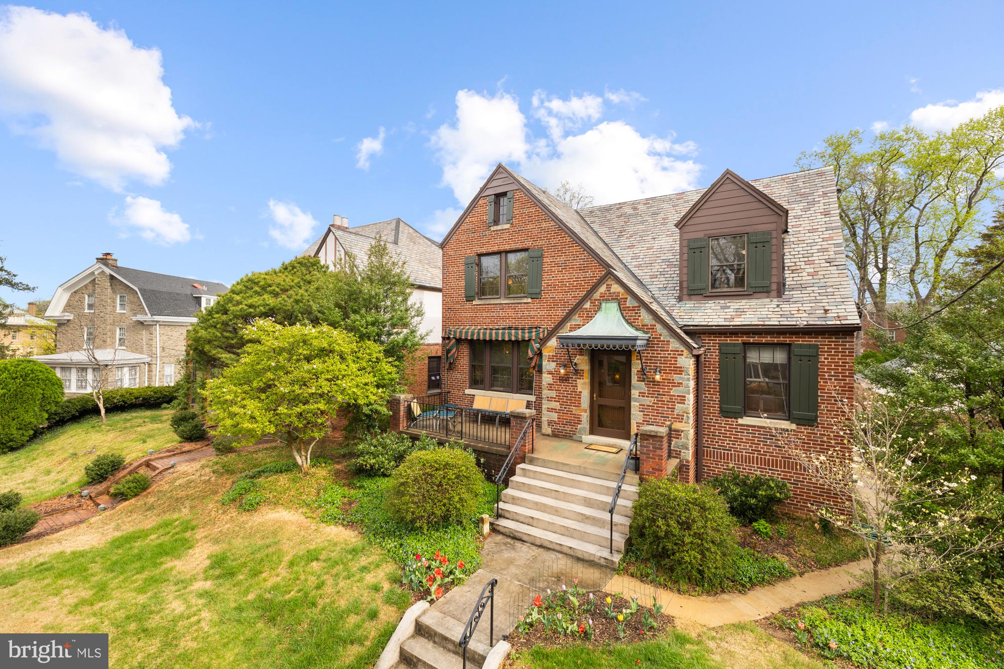 1441 Manchester Lane Northwest Washington, DC 20011 - Photo 2 of 63 a front view of a house with a yard