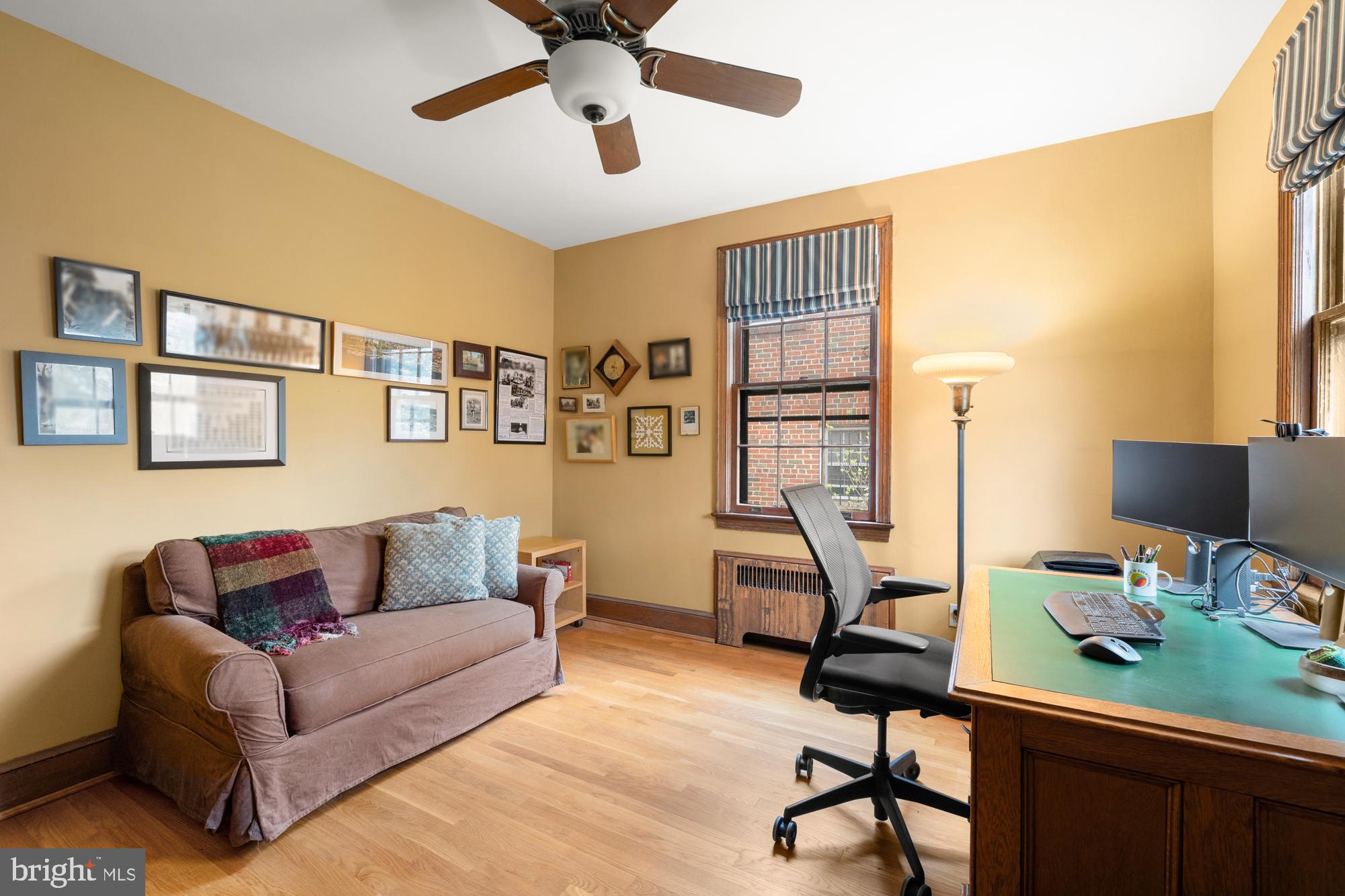 1441 Manchester Lane Northwest Washington, DC 20011 - Photo 21 of 63 a living room with furniture and a flat screen tv