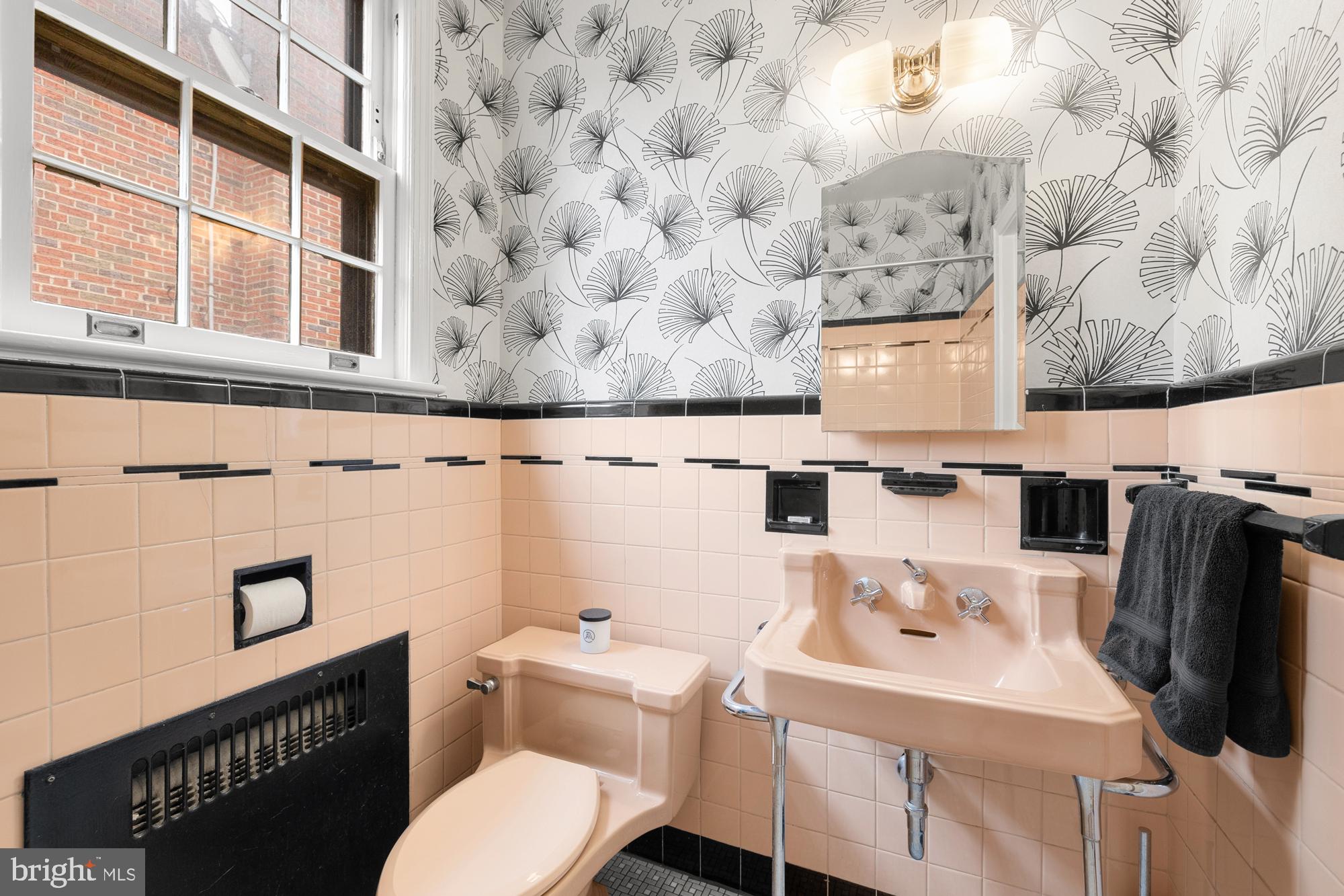 1441 Manchester Lane Northwest Washington, DC 20011 - Photo 22 of 63 a bathroom with a sink and a toilet