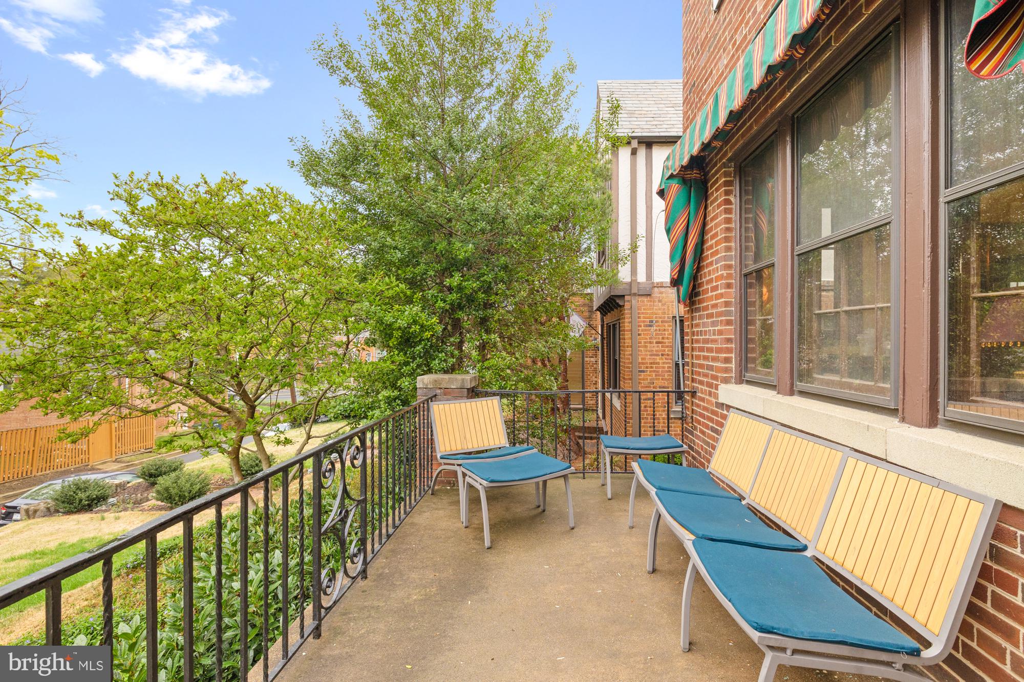 1441 Manchester Lane Northwest Washington, DC 20011 - Photo 3 of 63 a balcony with wooden floor and outdoor seating