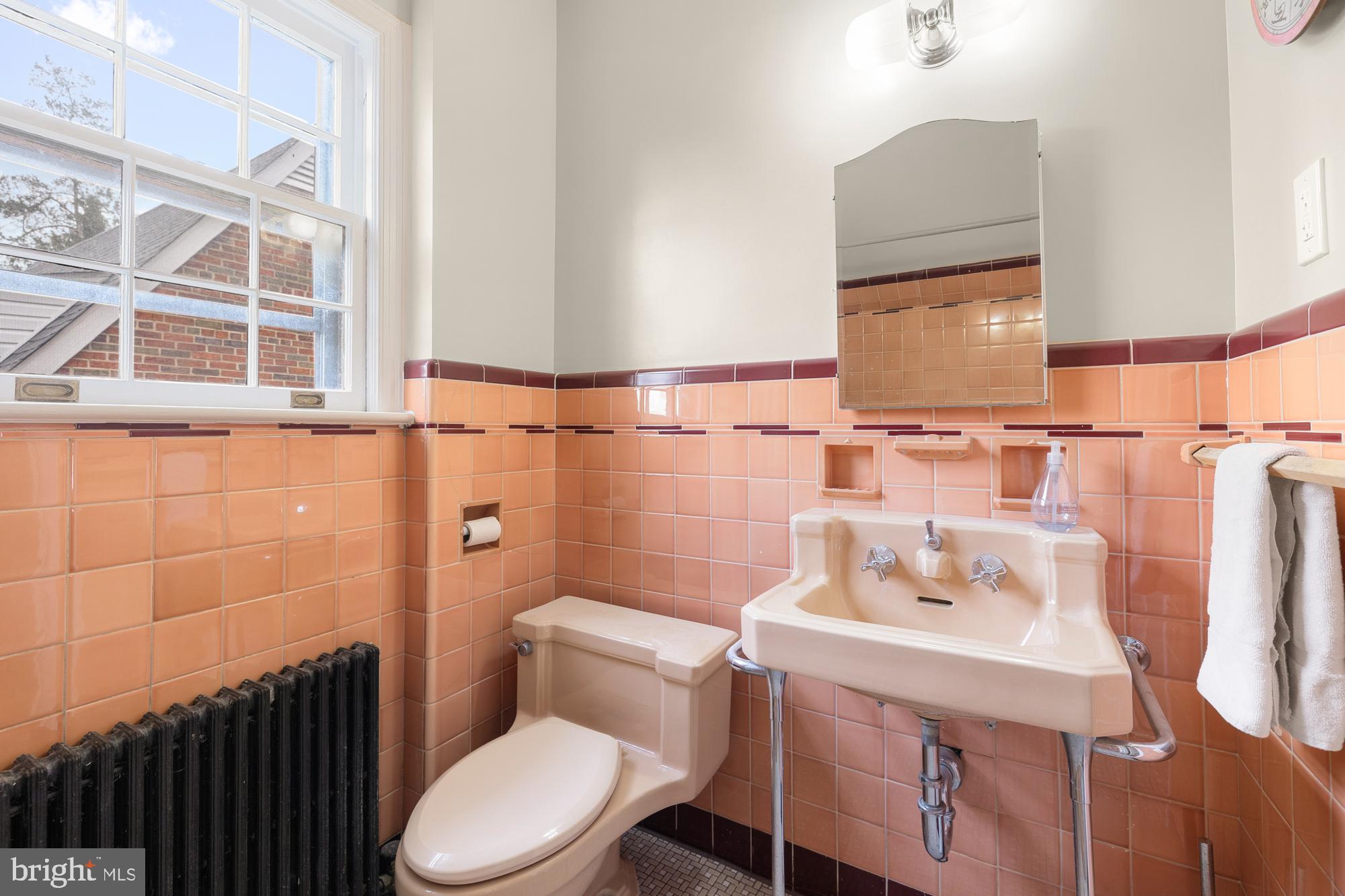 1441 Manchester Lane Northwest Washington, DC 20011 - Photo 30 of 63 a bathroom with a sink and a toilet