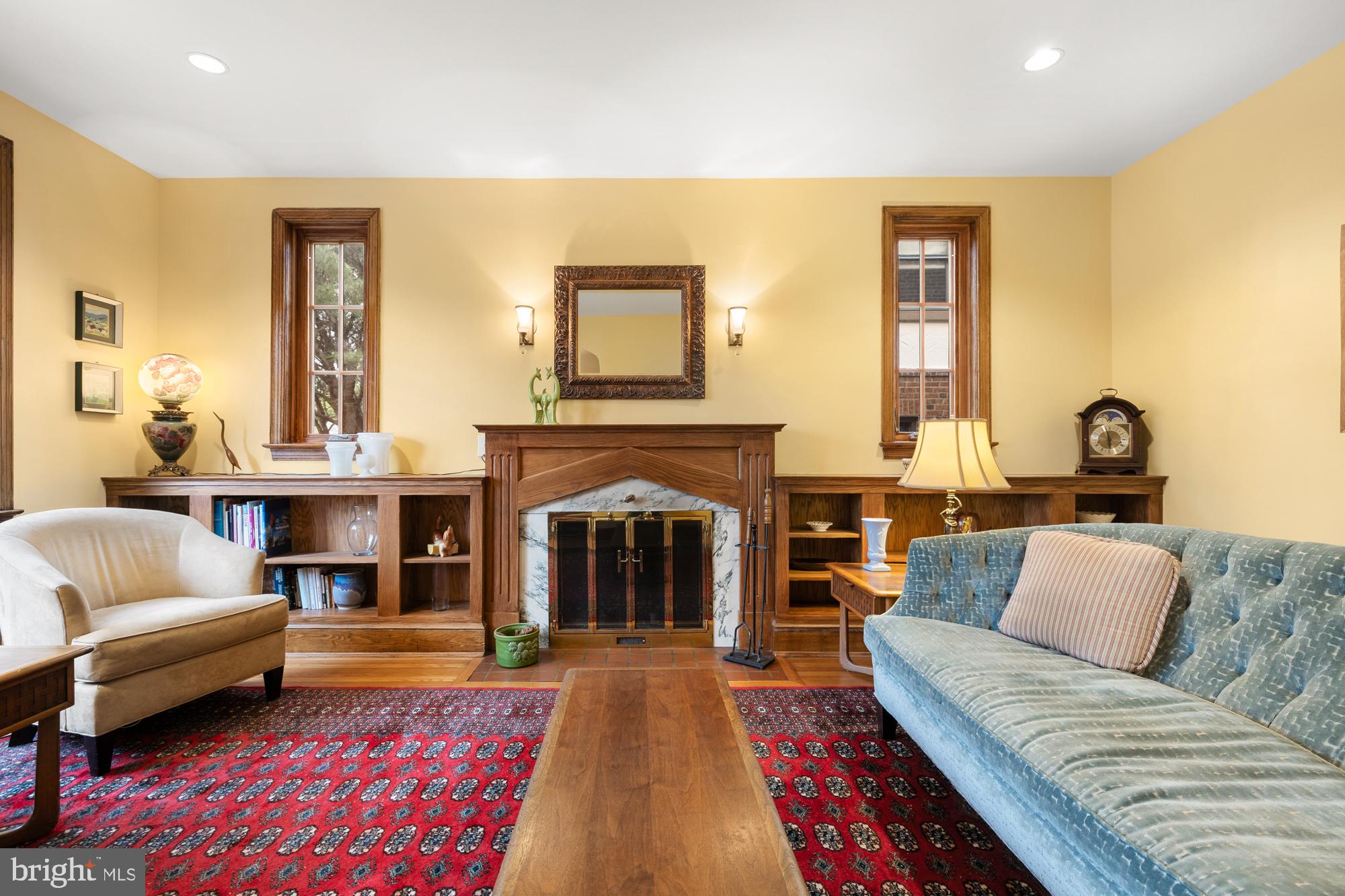 1441 Manchester Lane Northwest Washington, DC 20011 - Photo 4 of 63 a living room with furniture and a fireplace