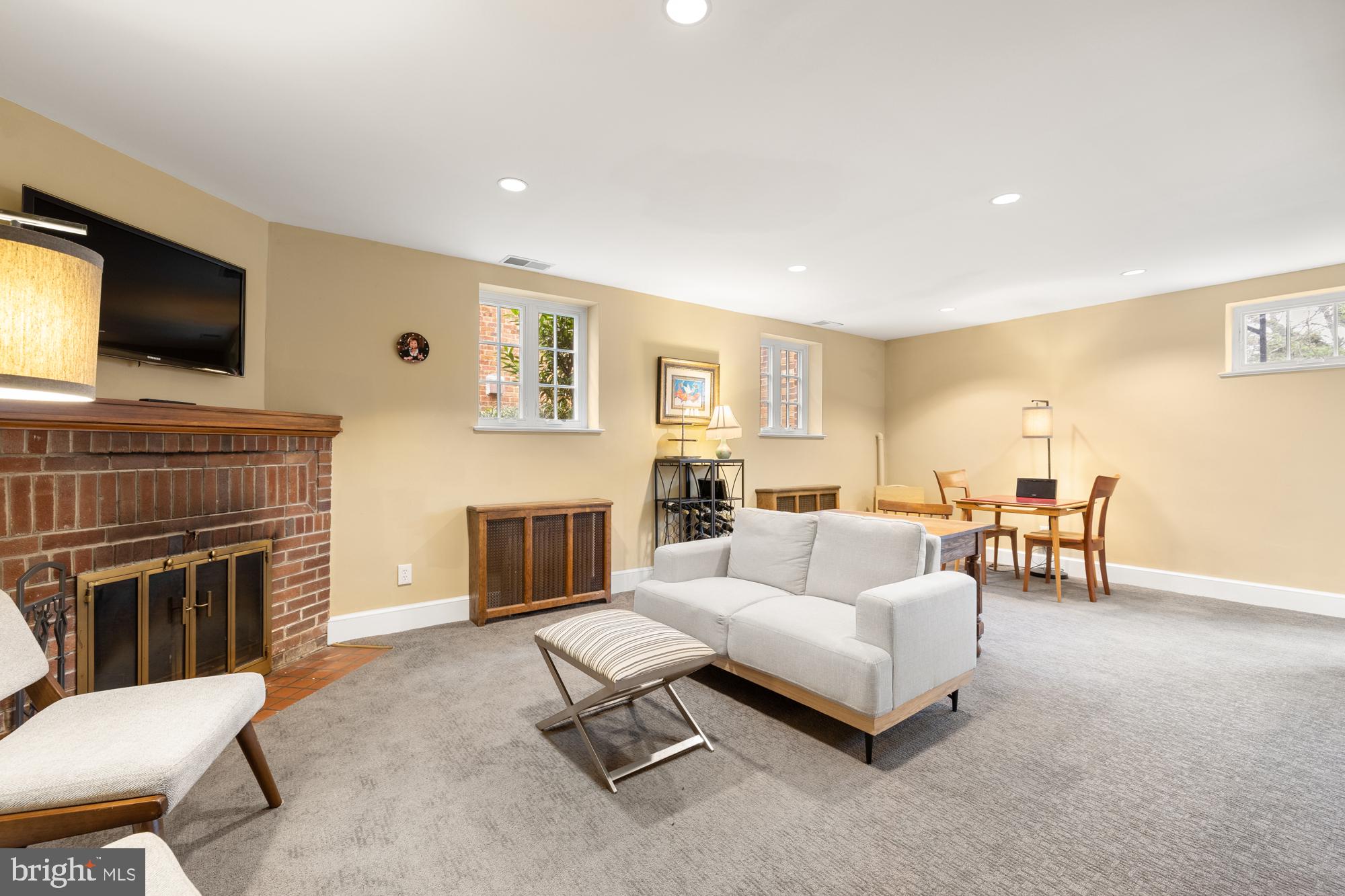 1441 Manchester Lane Northwest Washington, DC 20011 - Photo 39 of 63 a living room with furniture and a fireplace