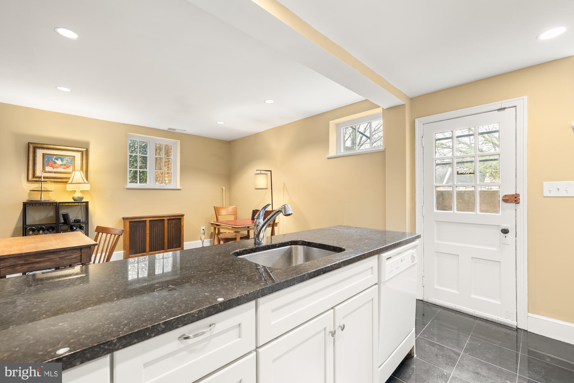 1441 Manchester Lane Northwest Washington, DC 20011 - Photo 46 of 63 a kitchen with a sink and cabinets