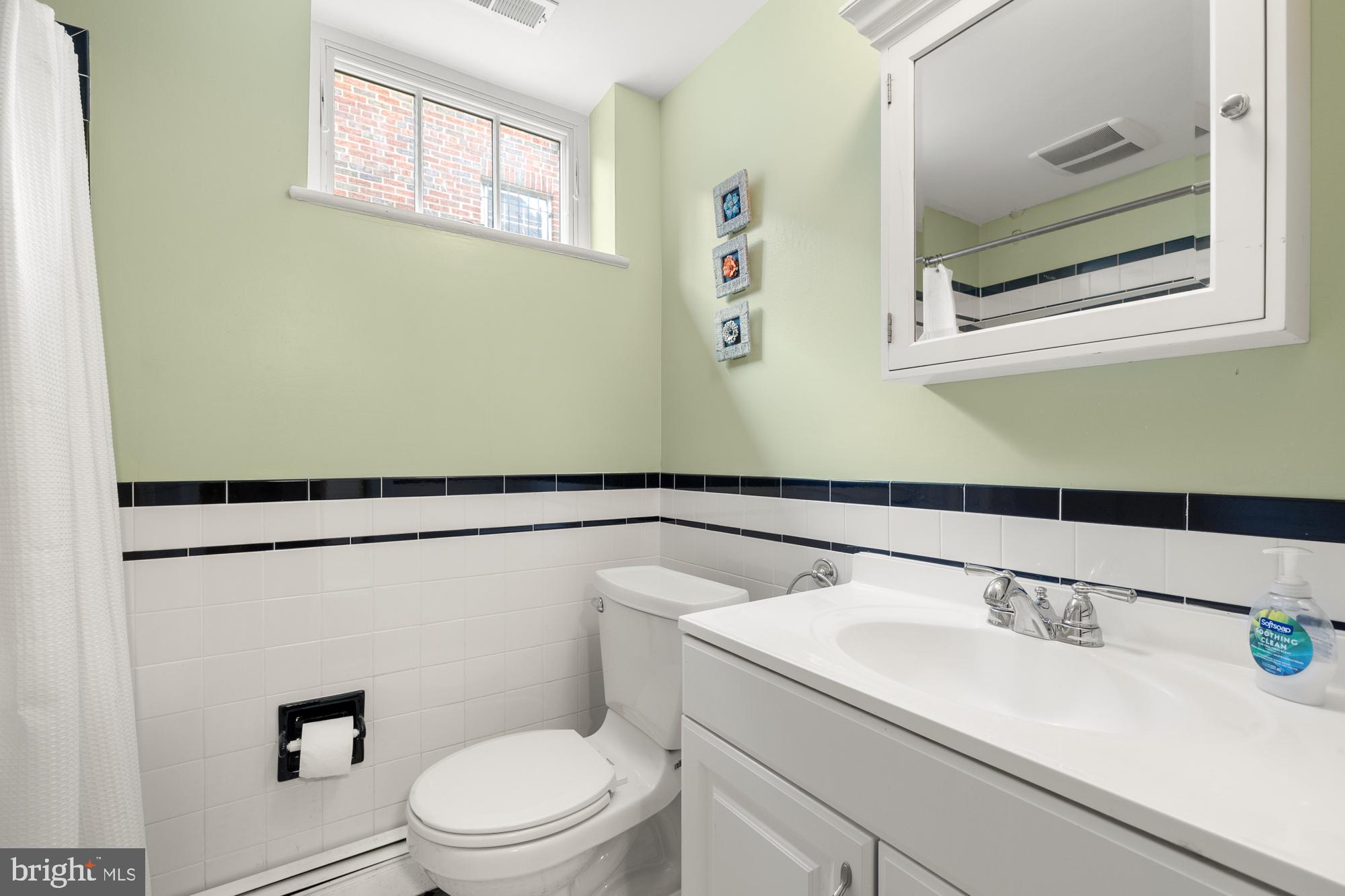 1441 Manchester Lane Northwest Washington, DC 20011 - Photo 49 of 63 a bathroom with a sink and a toilet