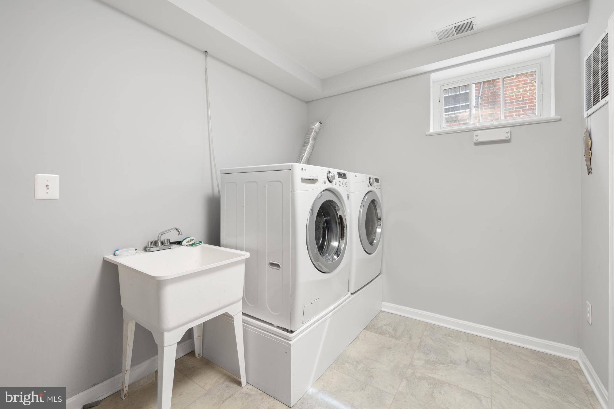 1441 Manchester Lane Northwest Washington, DC 20011 - Photo 51 of 63 a utility room with dryer and washer