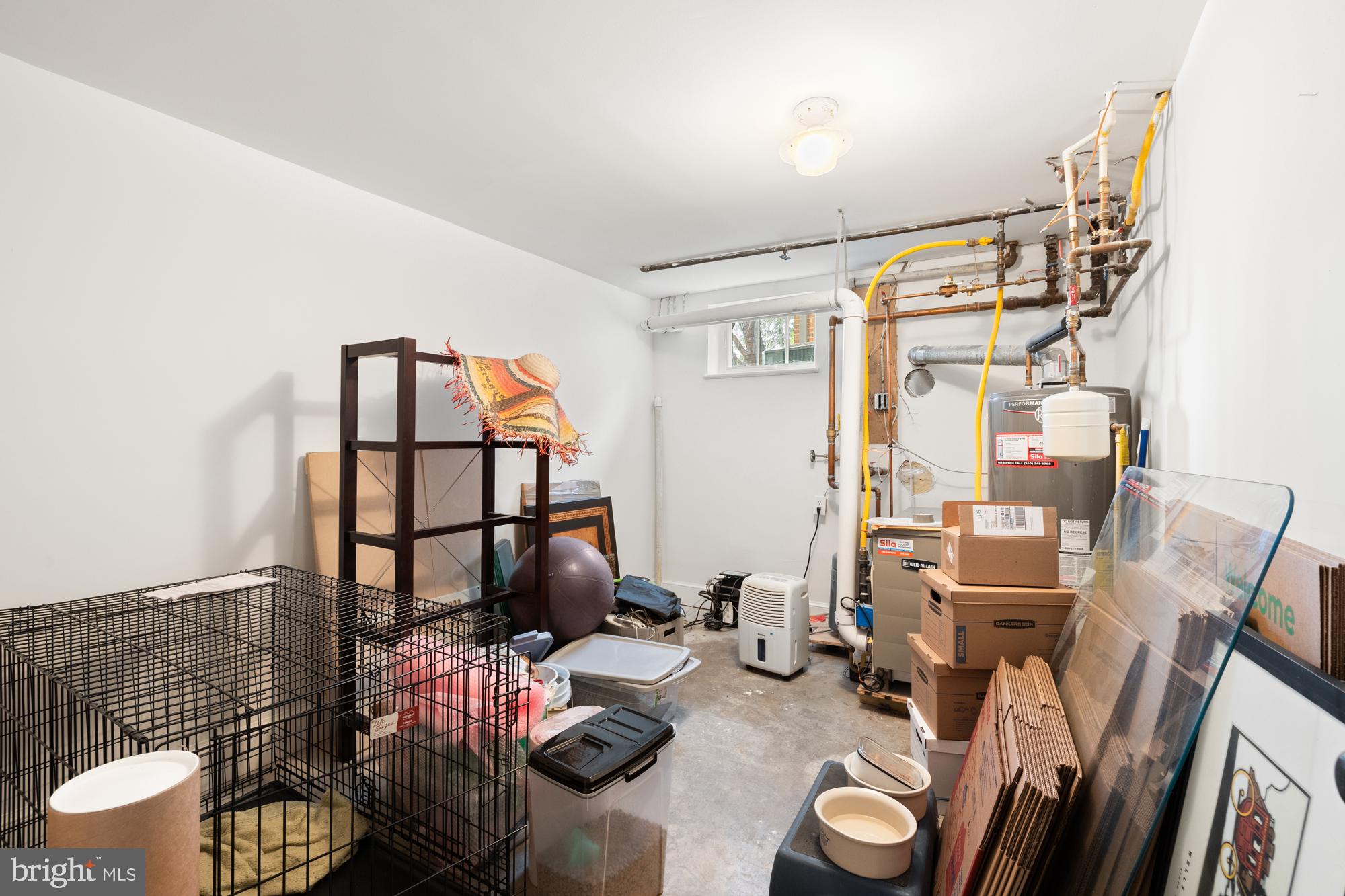 1441 Manchester Lane Northwest Washington, DC 20011 - Photo 52 of 63 a bedroom with furniture and a window