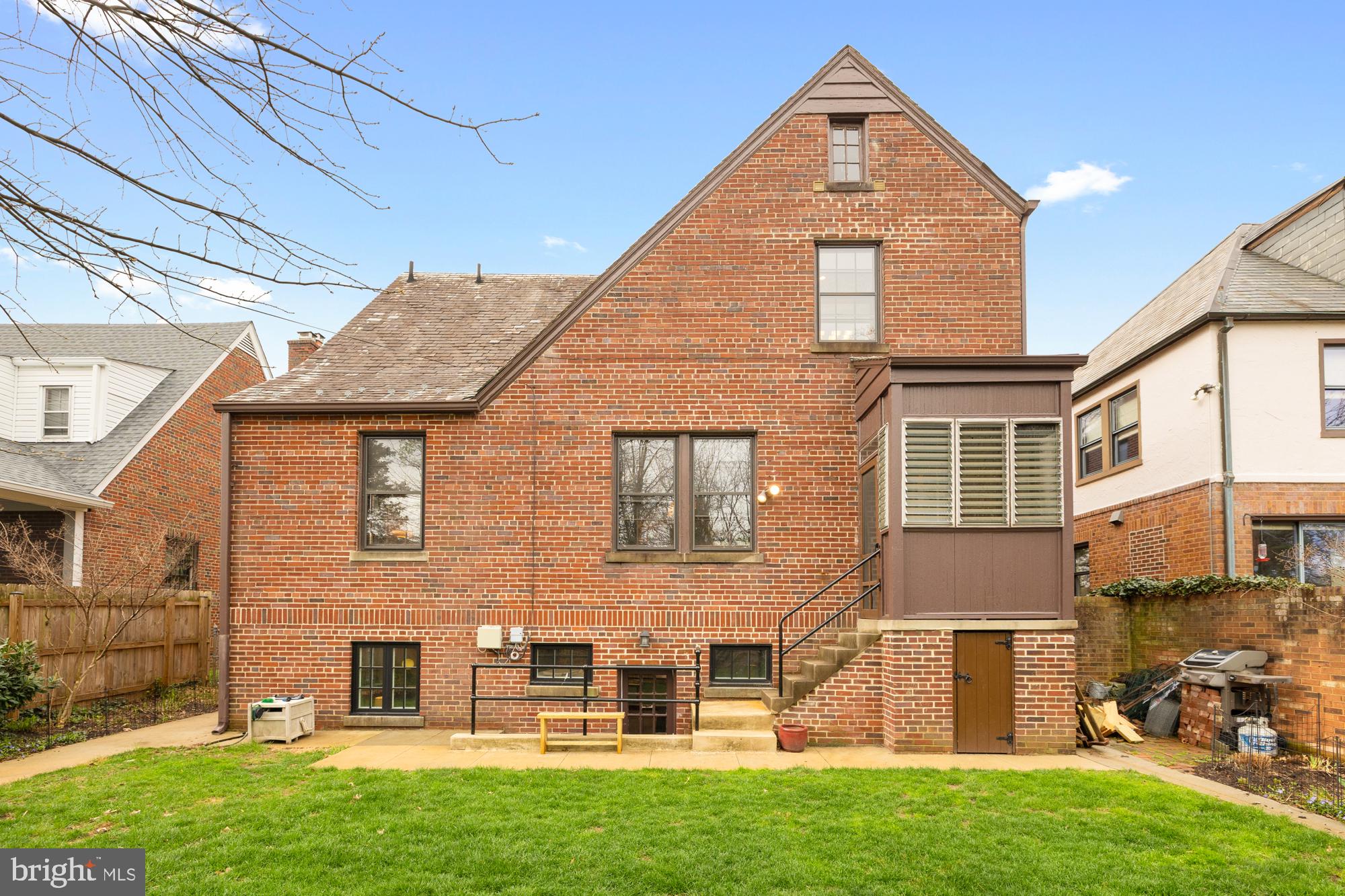 1441 Manchester Lane Northwest Washington, DC 20011 - Photo 56 of 63 a front view of a house with a yard