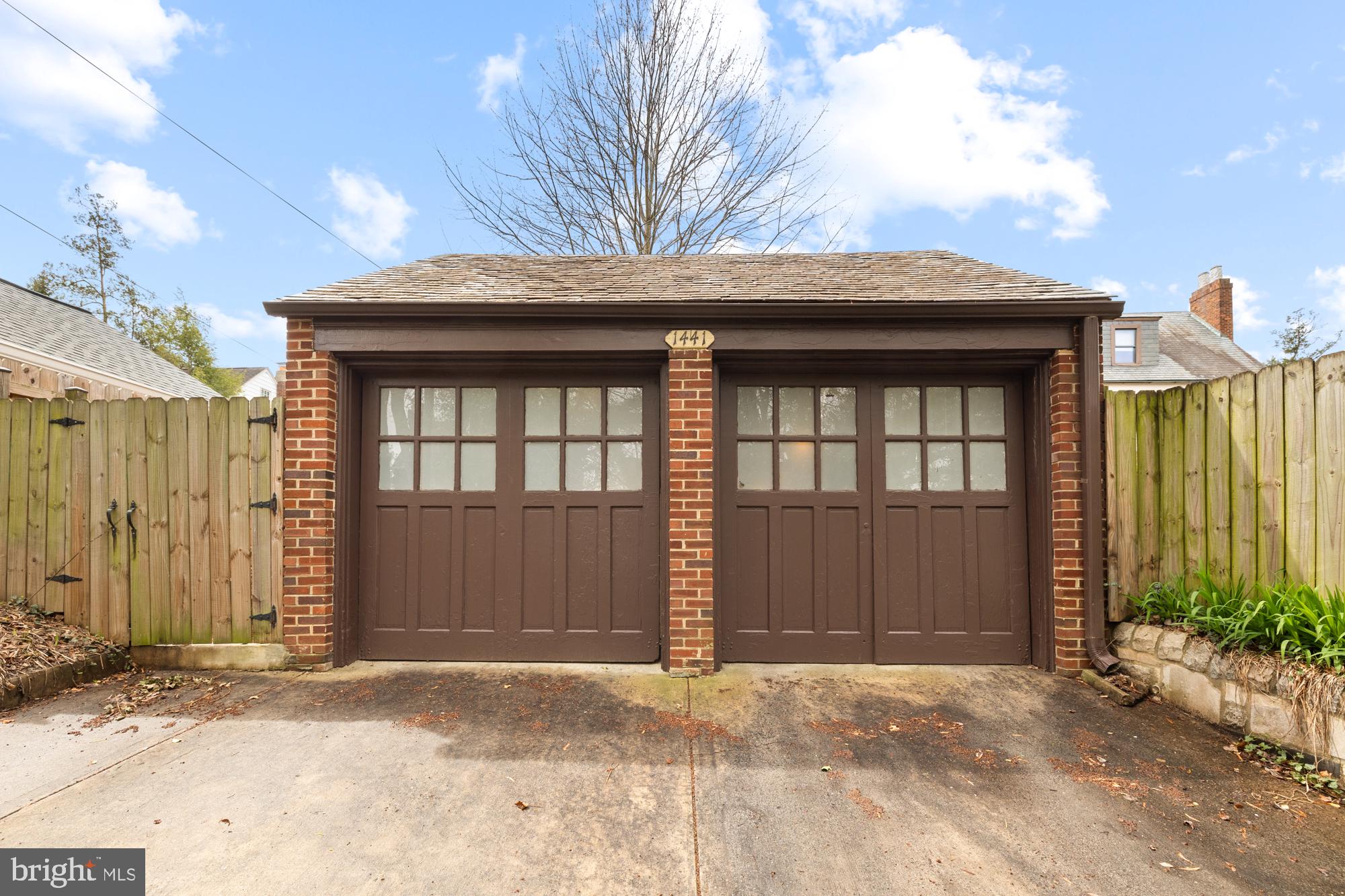 1441 Manchester Lane Northwest Washington, DC 20011 - Photo 57 of 63 a front view of a house with a garage