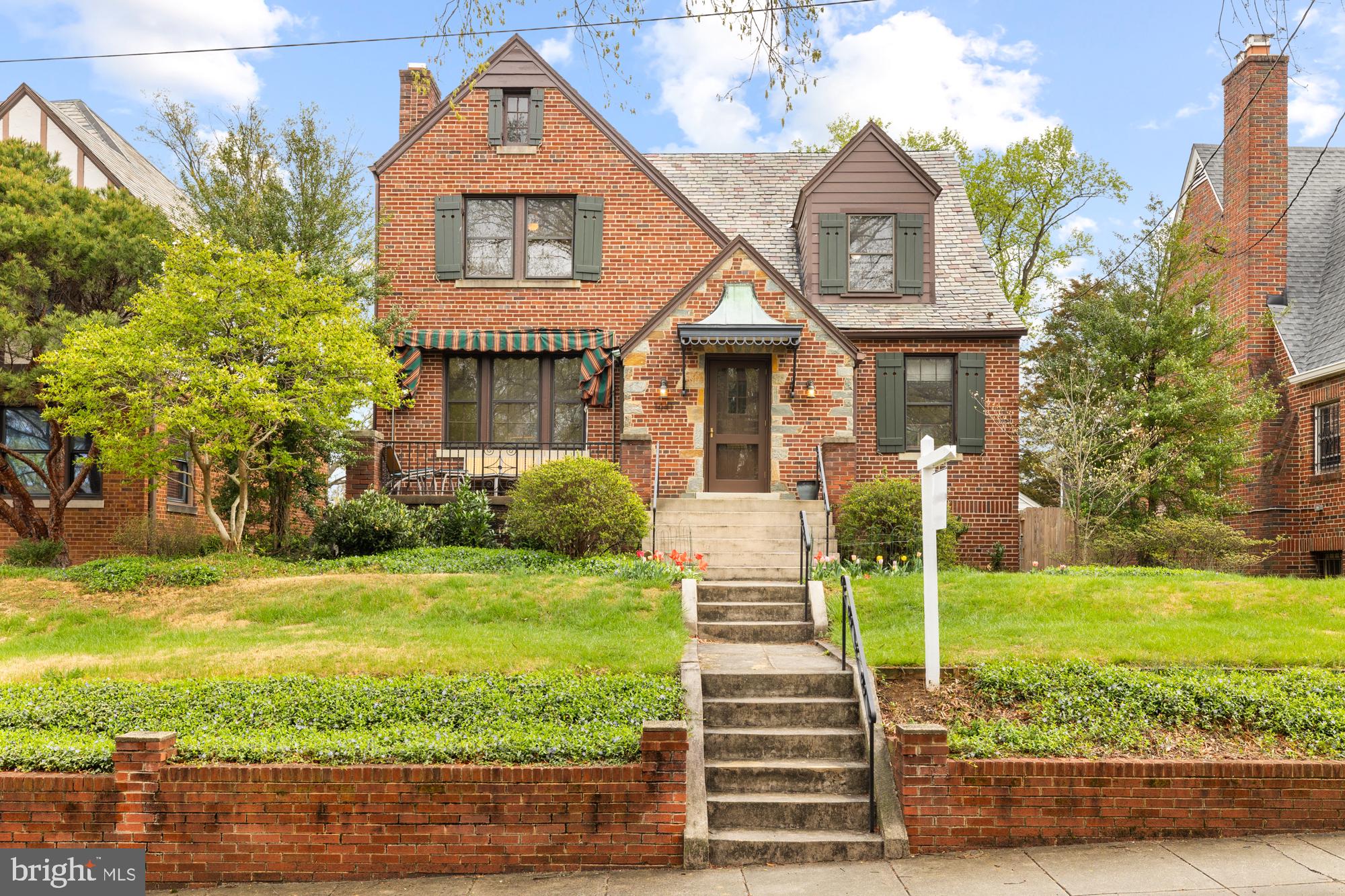 1441 Manchester Lane Northwest Washington, DC 20011 - Photo 58 of 63 a front view of a house with garden