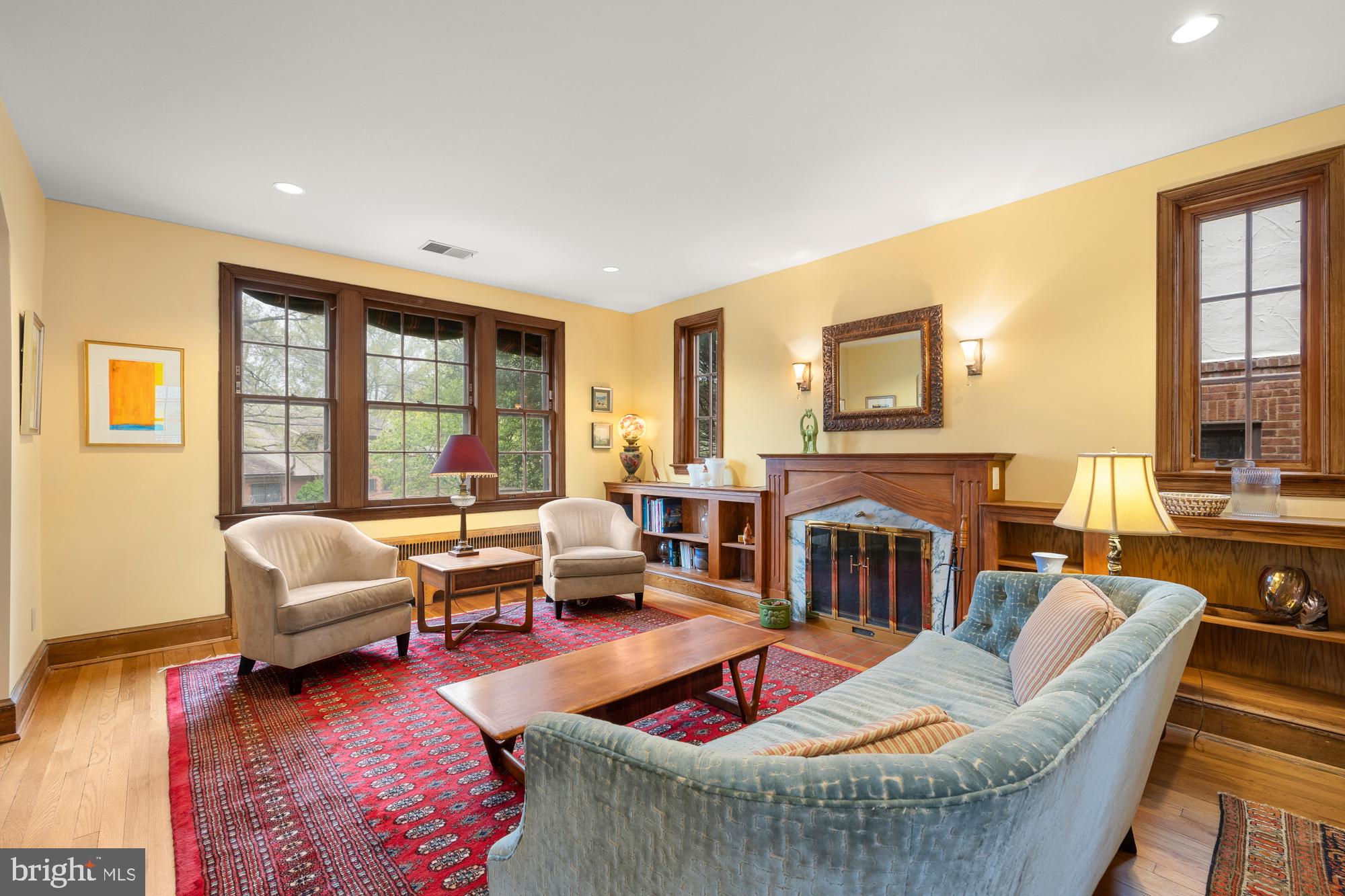 1441 Manchester Lane Northwest Washington, DC 20011 - Photo 9 of 63 a living room with furniture and a fireplace