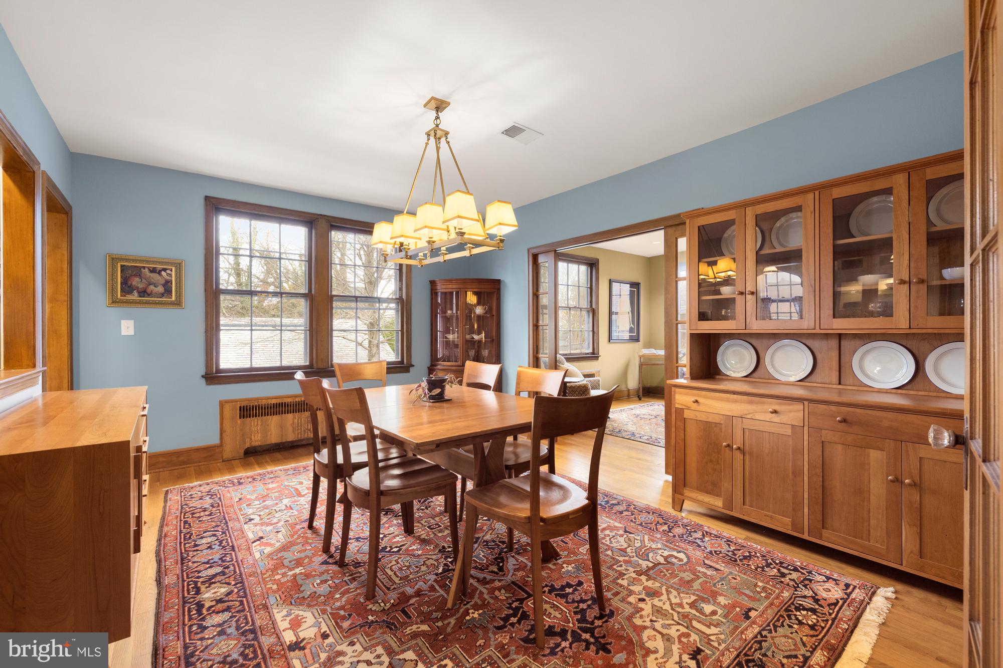 1441 Manchester Lane Northwest Washington, DC 20011 - Photo 10 of 63 a view of a dining room with furniture a chandelier and wooden floor