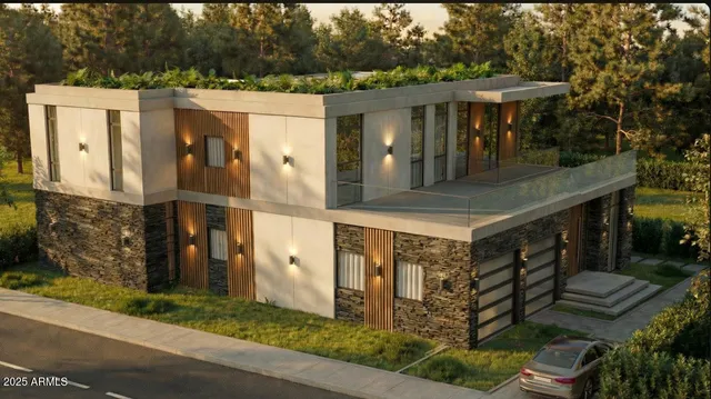 a view of a house with a small yard